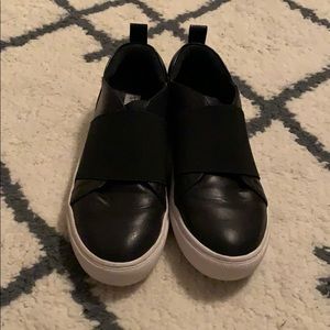 Black slip on sneakers